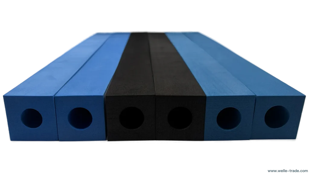 Custom Hollow PE/EVA Foam Columns: Six rectangular foam bars (four blue, two black) arranged in a row, each with a precision-cut central circular hollow, showcasing uniform porous texture and smooth matte finish against a white background; the website "www.welle-trade.com" is visible at the bottom right.